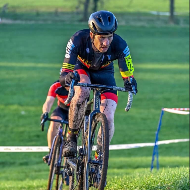 Mark riding his bike in a cyclocross race